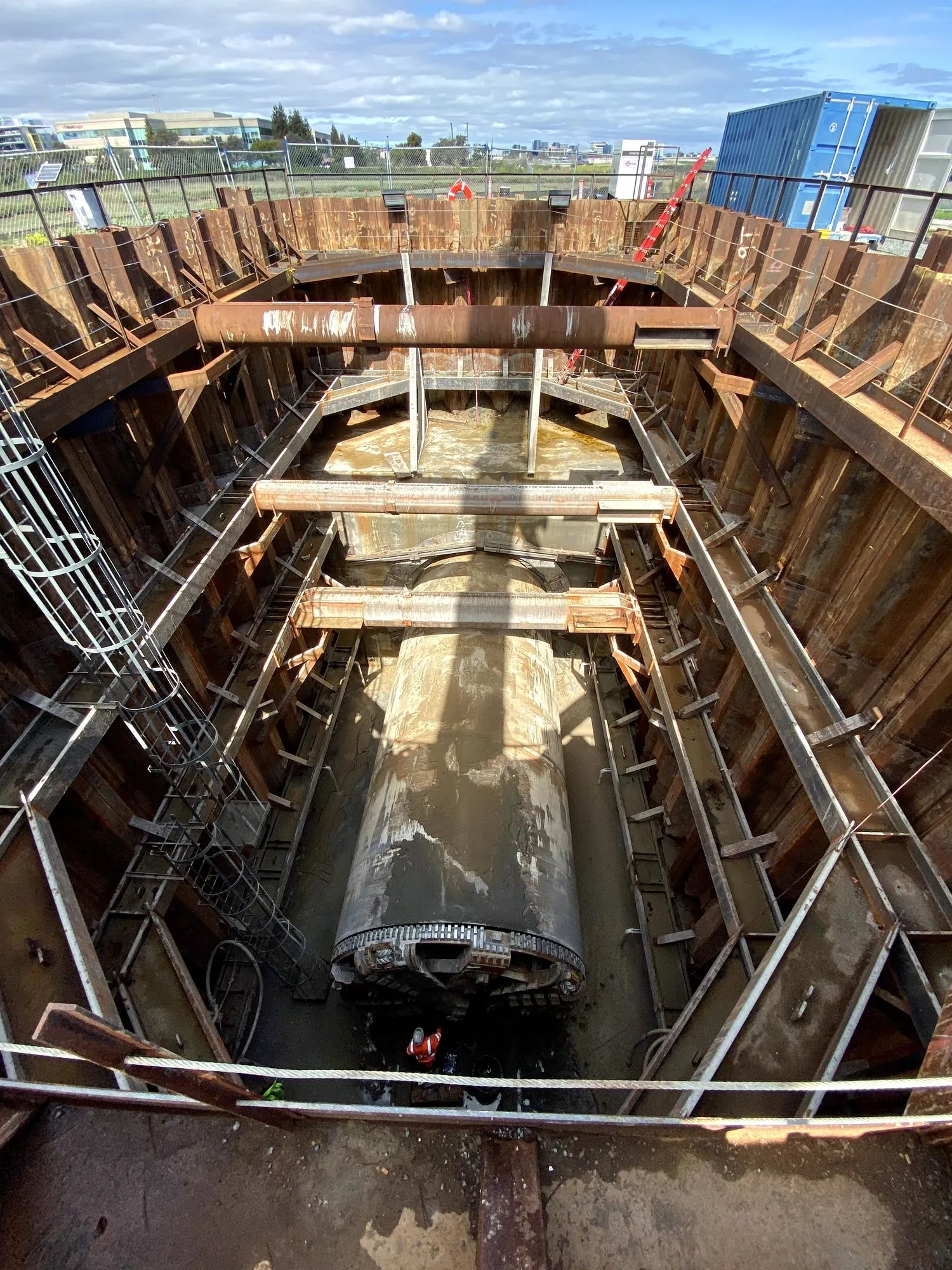 Tunnel boring machine shield in a braced launch shaft, seen from the surface